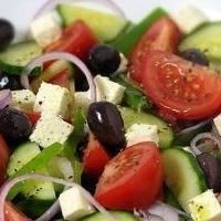 Greek salad with feta, olives, tomatoes, and cucumbers.