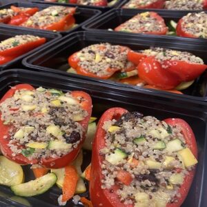 Vegan stuffed peppers. Stuffed with quinoa, zucchini, and broccoli